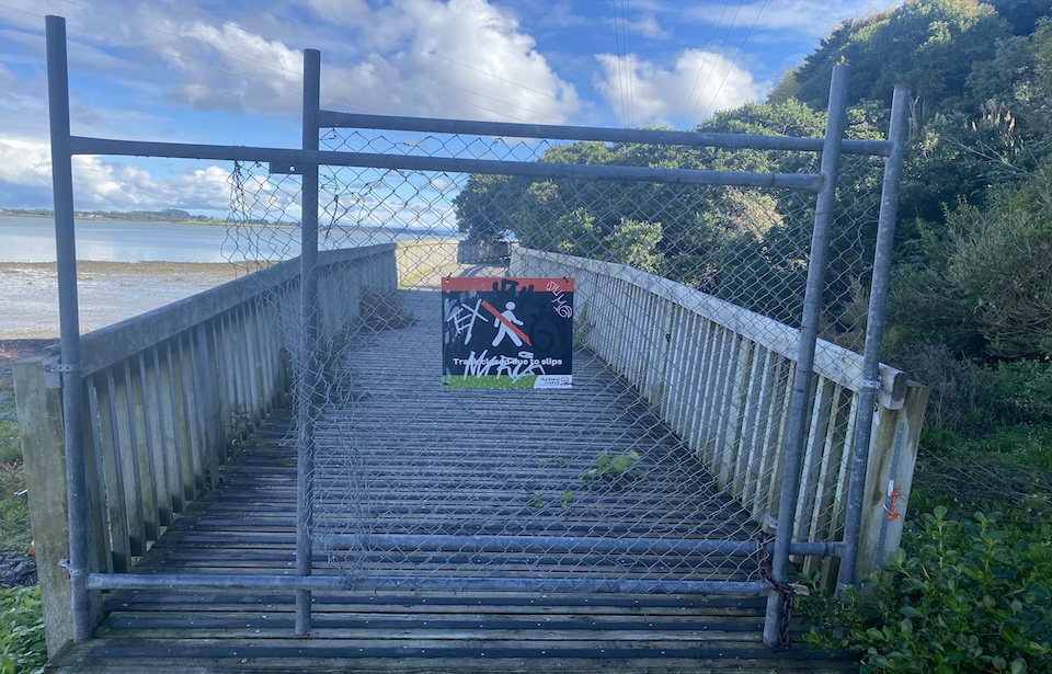 This temporary fencing isn’t doing much to stop entry onto this unstable boardwalk. Photo: Ben McQueen