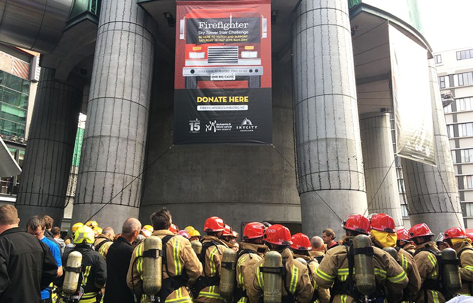 Firefighters ascend the Sky Tower in support of charity