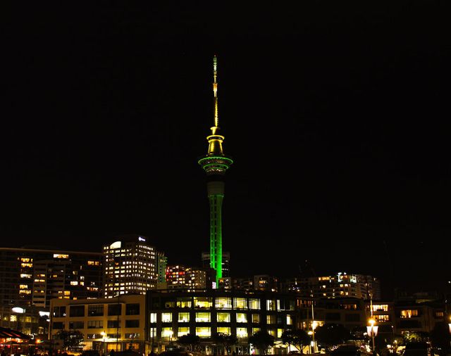 City painted green and yellow by Auckland landmarks