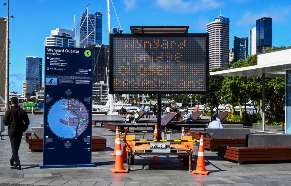 Signs warn pedestrians of the closure of Wynyard crossing bridge, a main route for connecting commuters from Britomart station and customers seeking hospitality along the waterfront. Photo: Vivek Panchal 