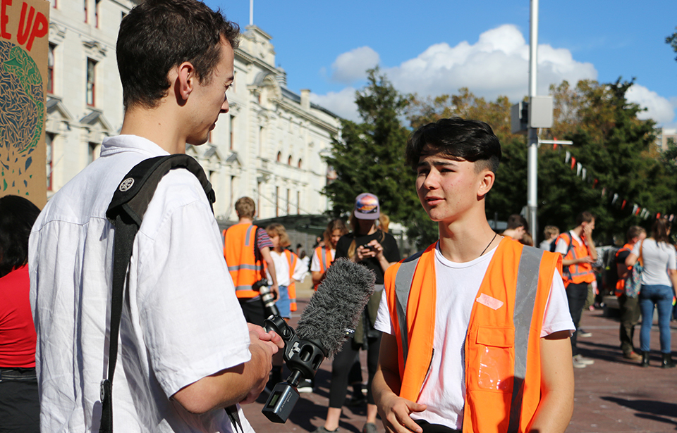 Auckland School Strike 4 Climate co-ordinator Luke Wijohn, 17, speaks to the media on Friday before the march down Queen St.
