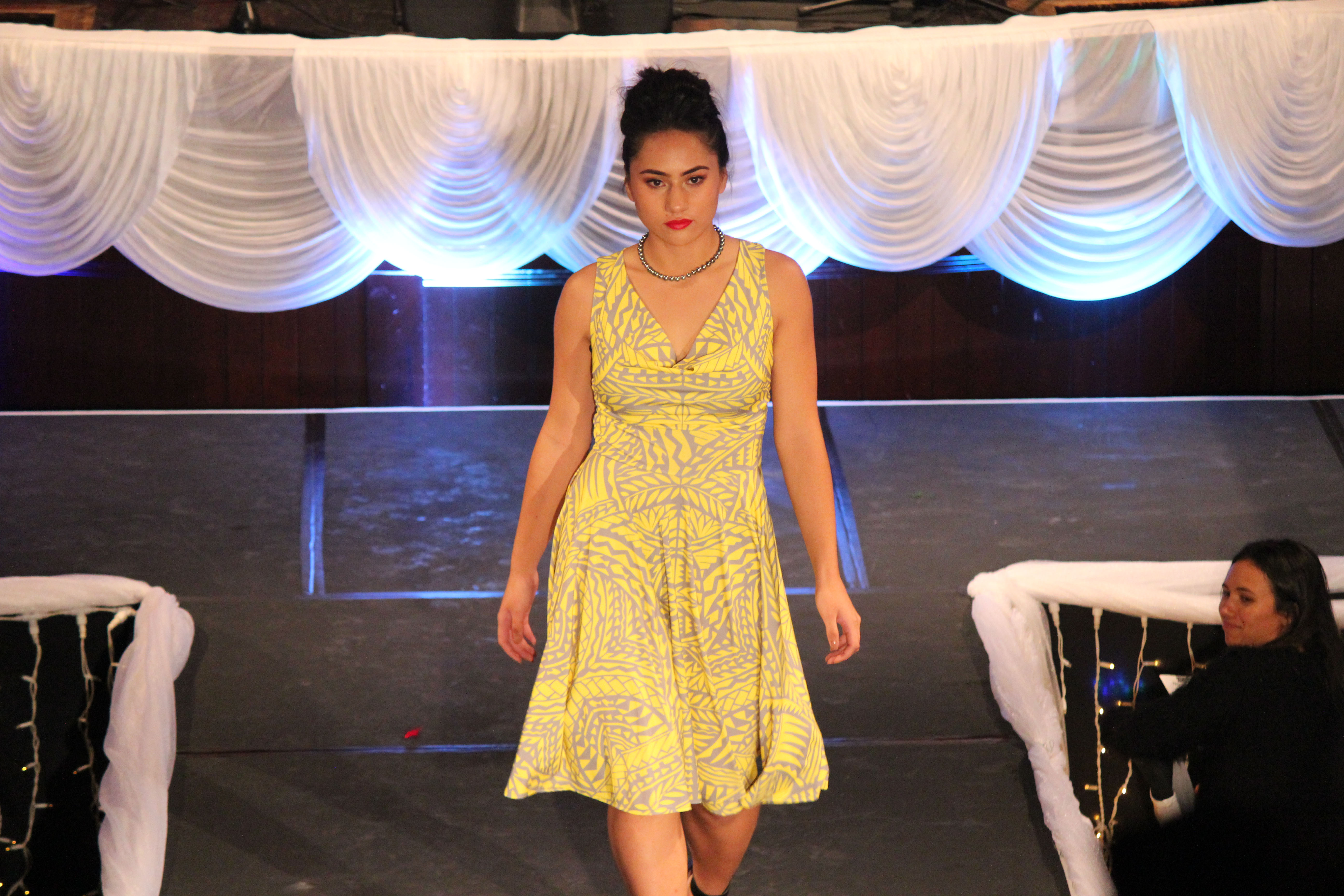 A woman in a colorful dress